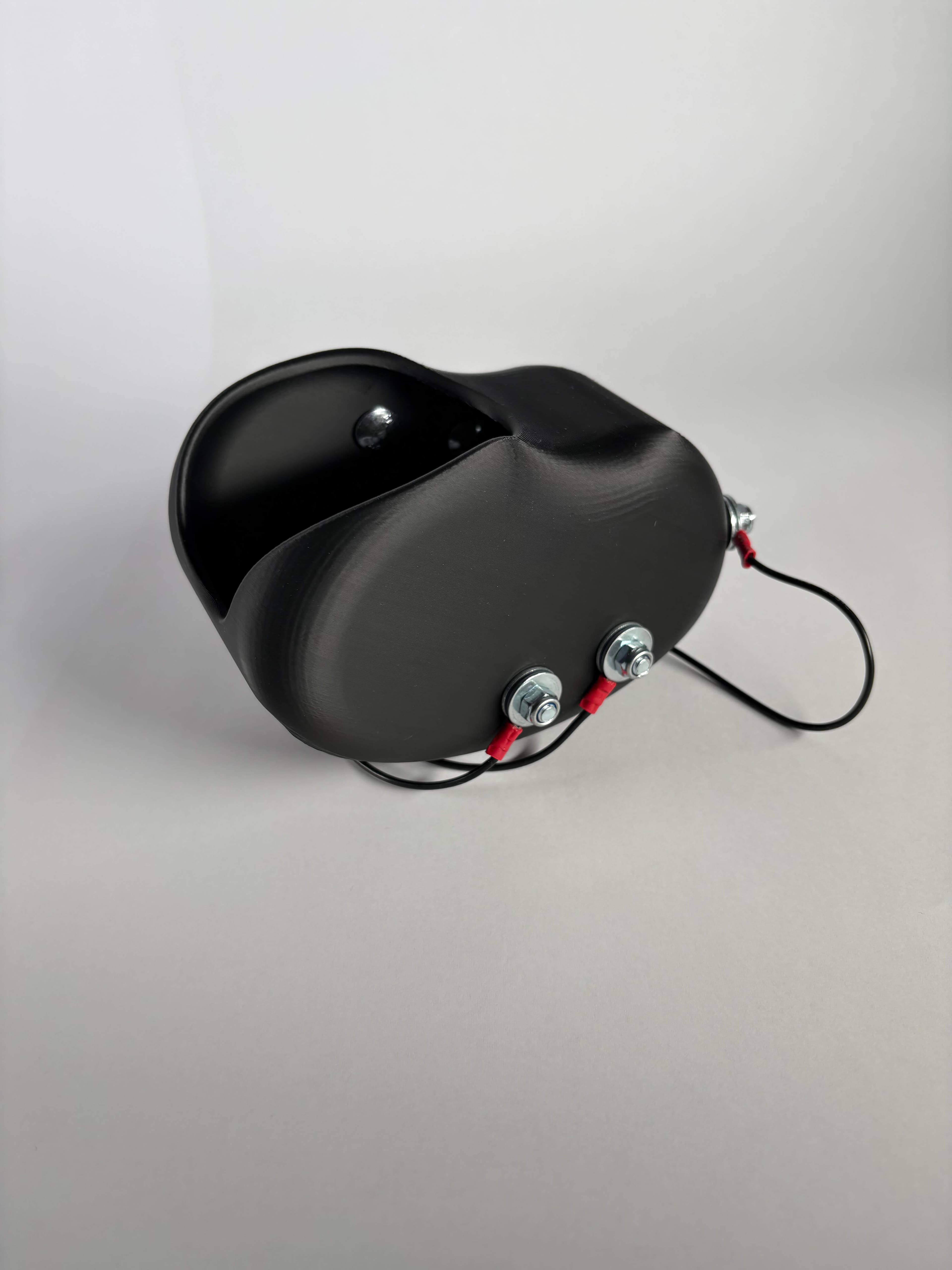 The Origin BCI myoelectric sensors viewed from the side.